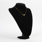 buy online an authentic second hand Christian Dior golden-toned necklace in very good condition at Labellov in Antwerp.