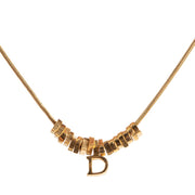 buy online an authentic second hand Christian Dior golden-toned necklace in very good condition at Labellov in Antwerp.