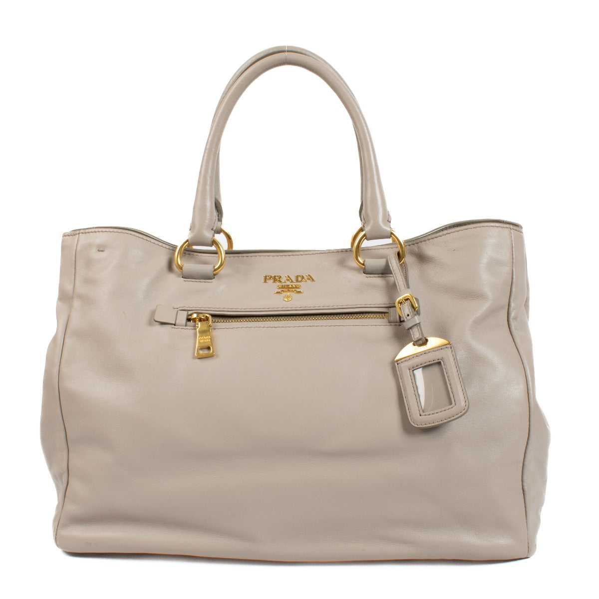 Prada Pomice Soft Calf Tote Bag in light grey soft calf leather with dual top handles, structured design, and spacious interior for everyday use. Shop now on Labellov.com.