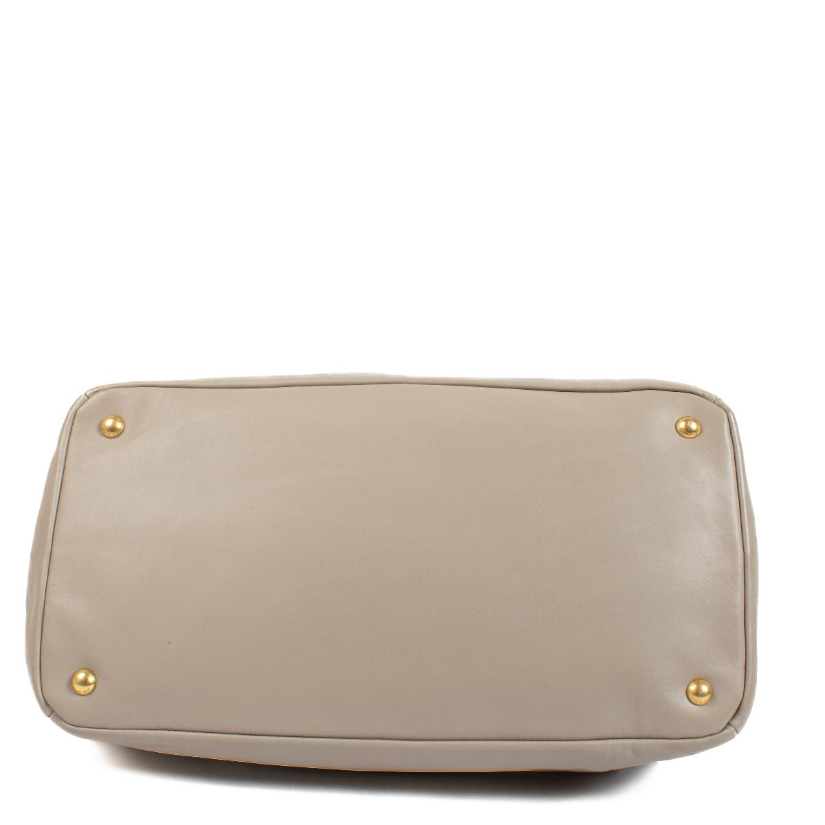 Prada Pomice Soft Calf Tote Bag in light grey soft calf leather with dual top handles, structured design, and spacious interior for everyday use. Shop now on Labellov.com.