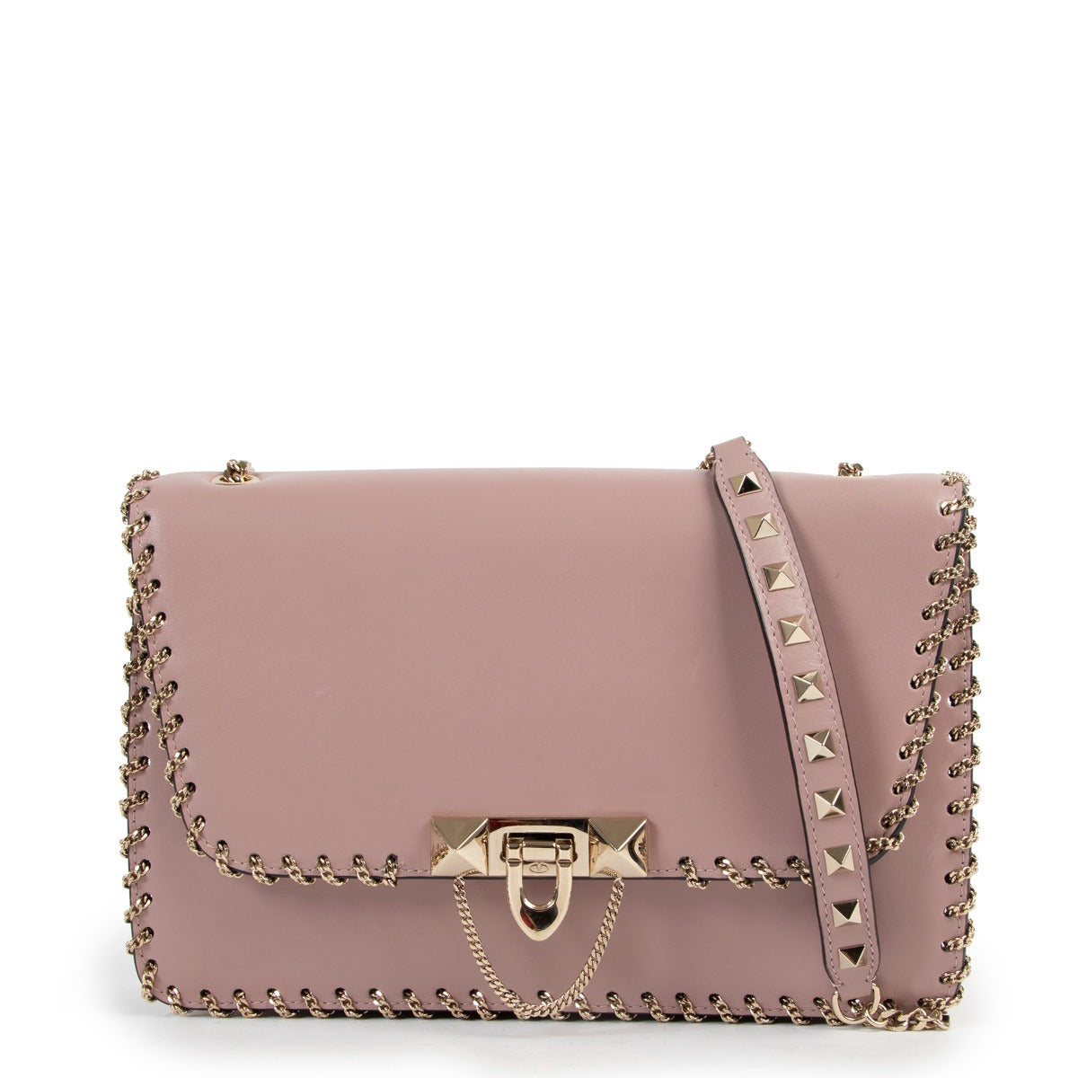 Buy online an authentic second hand Valentino Garavani Pink Rockstud Demilune Whipstitch Crossbody in good condition at Labellov in Antwerp.