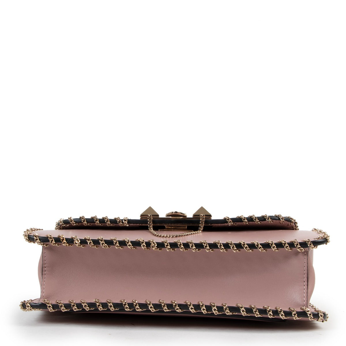 Buy online an authentic second hand Valentino Garavani Pink Rockstud Demilune Whipstitch Crossbody in good condition at Labellov in Antwerp.