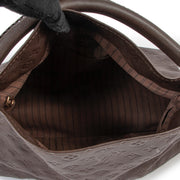 Buy online an authentic second hand Louis Vuitton Brown Empreinte Leather Artsy Monogram MM Shoulder Bag in very good condition at Labellov in Antwerp.