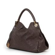 Buy online an authentic second hand Louis Vuitton Brown Empreinte Leather Artsy Monogram MM Shoulder Bag in very good condition at Labellov in Antwerp.
