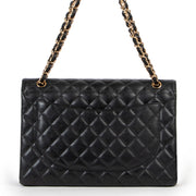 Buy an authentic second hand Chanel Black Caviar Maxi Classic Double Flap Bag as new at Labellov.
