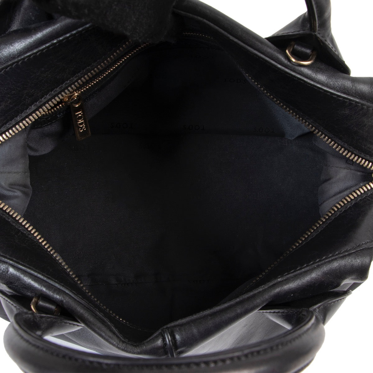 Buy an authentic second hand Tod's Black leather D Styling Bauletto Top Handle in good condition at Labellov