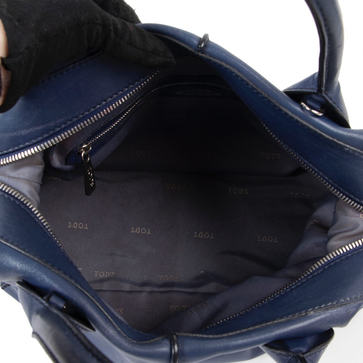 Buy online an authentic second hand Tod's Dark Blue leather D Styling Bauletto Top Handle in very good condition at Labellov in Antwerp