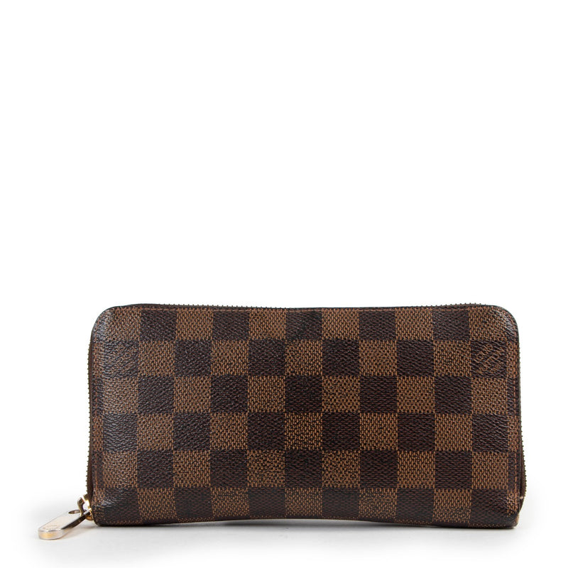 Second hand authentic luxury designer Louis Vuitton Zippy Wallet Damier Ebene Canvas at Labellov