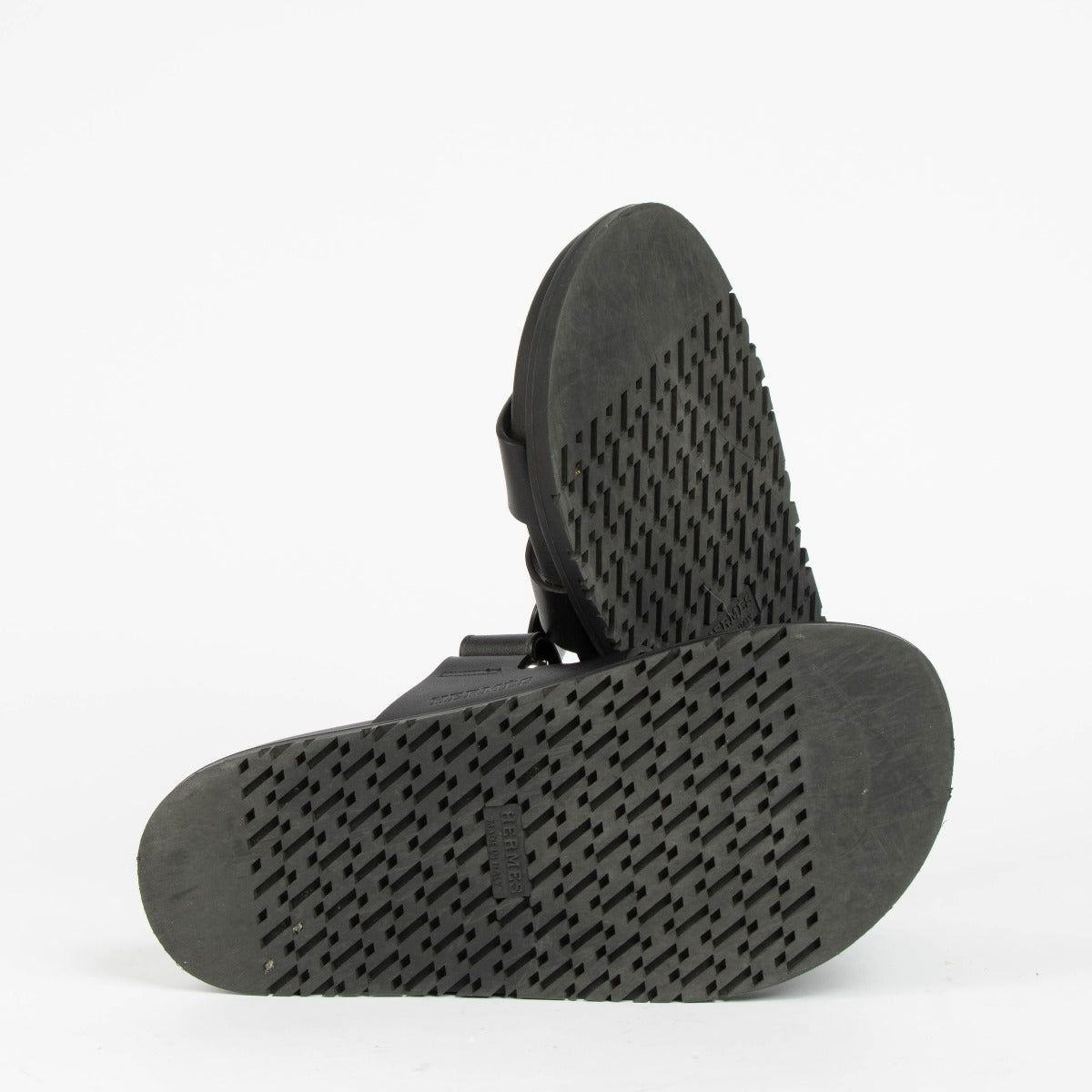 Shop this 100% authentic Hermès Black Chypre Sandals in size 36 at Labellov.com