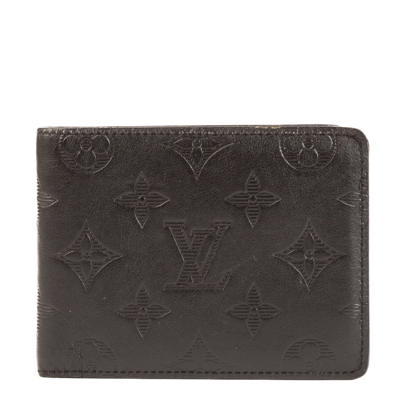 Shop safe online at Labellov in Antwerp, Brussels and Knokke this 100% authentic second hand Louis Vuitton Black Monogram Shadow Leather Multiple Wallet