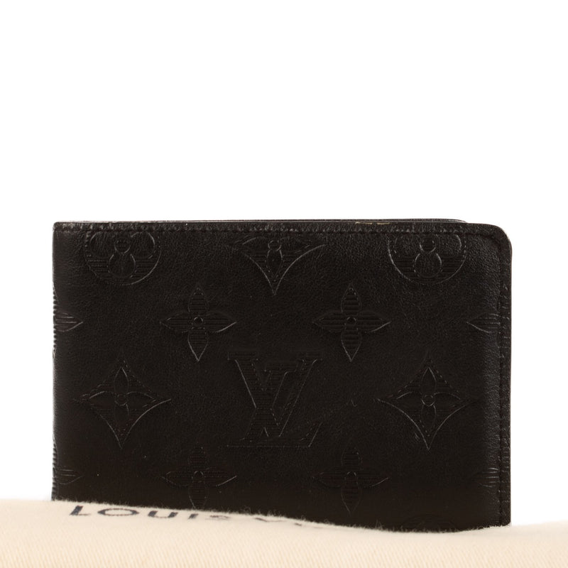 Shop safe online at Labellov in Antwerp, Brussels and Knokke this 100% authentic second hand Louis Vuitton Black Monogram Shadow Leather Multiple Wallet