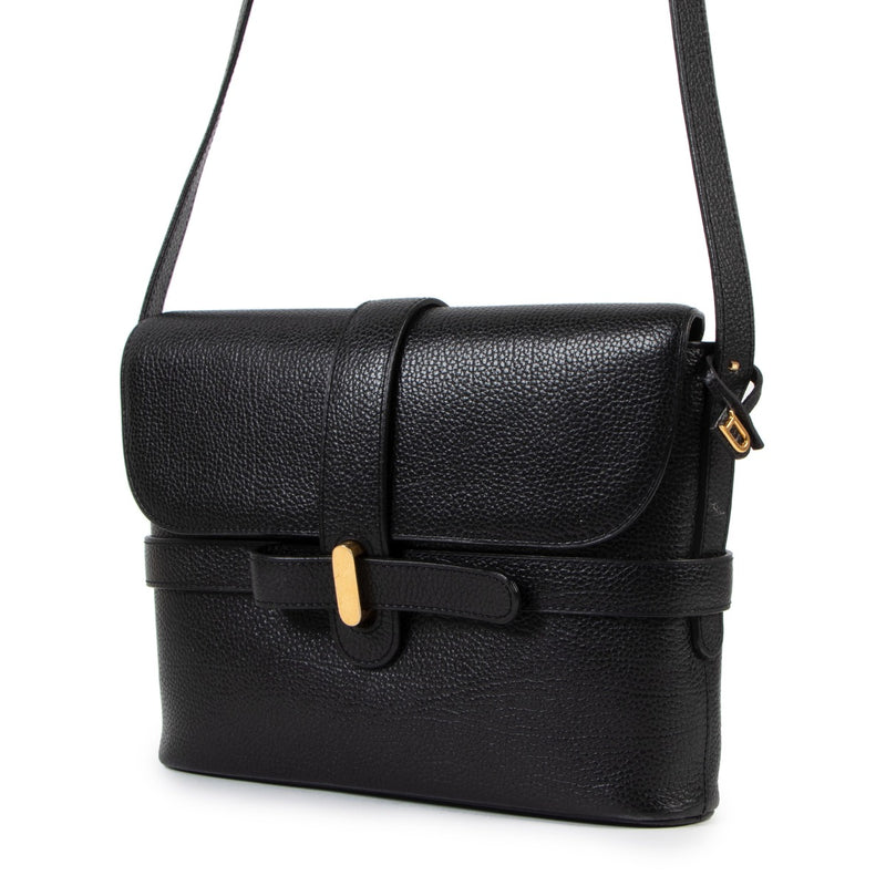 Buy online an authentic second hand Delvaux Simoun PM black leather crossbody bag in very good condition at Labellov in Antwerp.