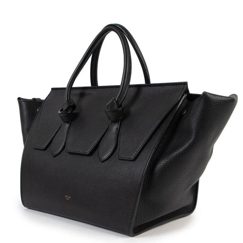 Buy online an authentic second hand Celine Black Medium Tie Knot Grained Leather Tote Bag in very good condition at Labellov in Antwerp.