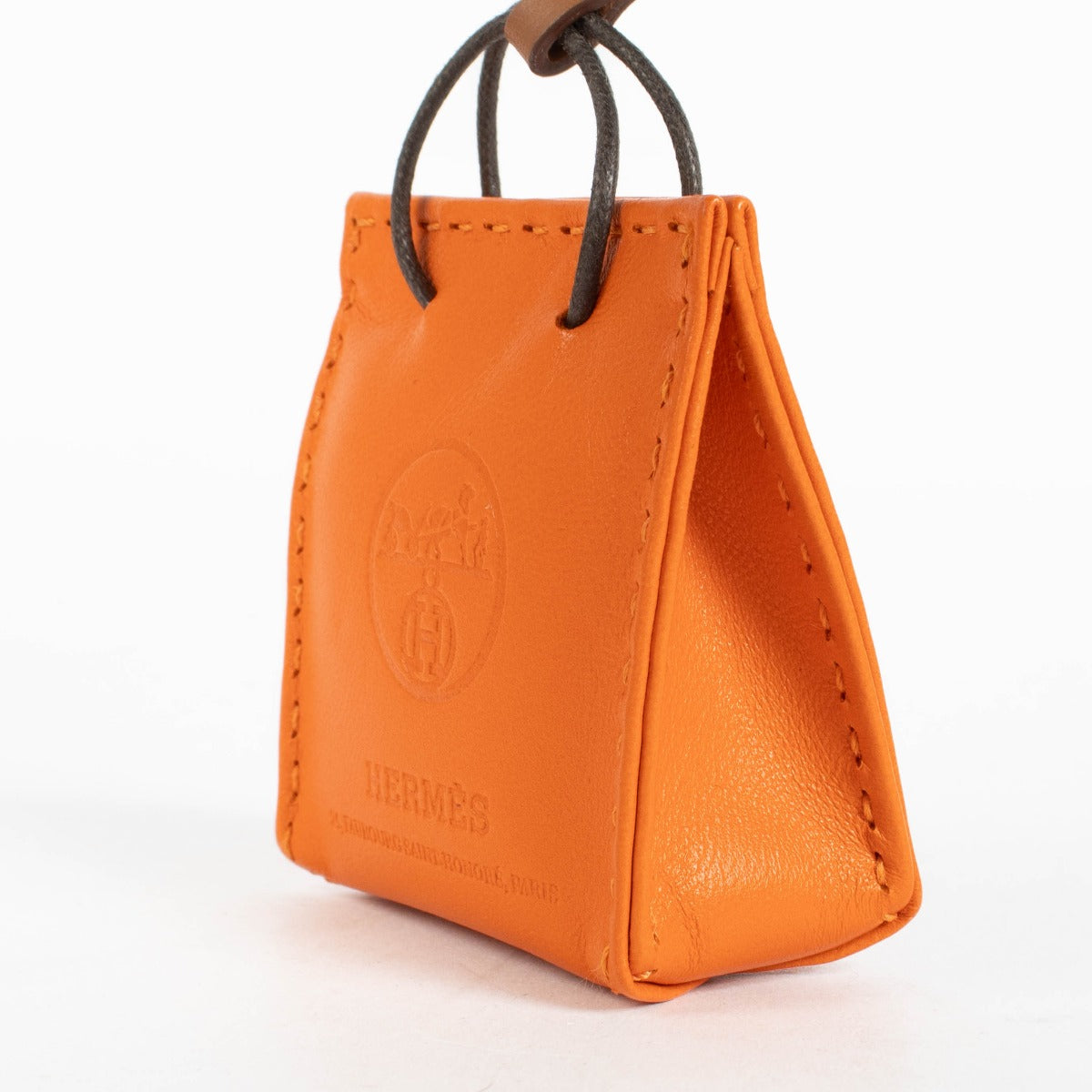 shop 100% authentic second hand Hermès Orange Shopping Bag Charm on Labellov.com