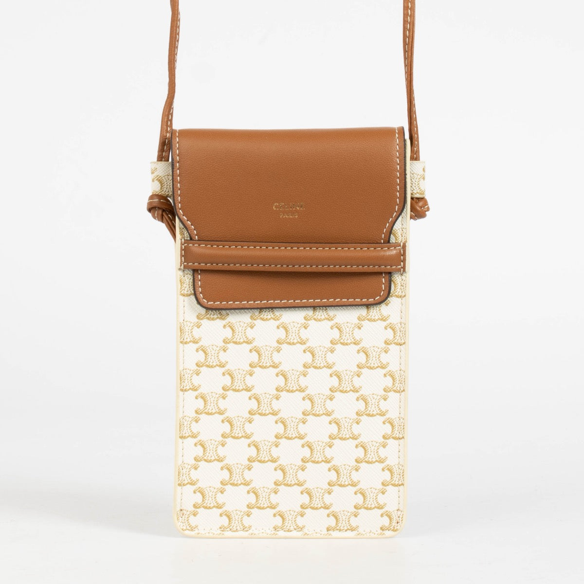 Authentic pre-loved Celine Brown/White Leather/Canvas Triomphe Phone holder on Labellov.com
