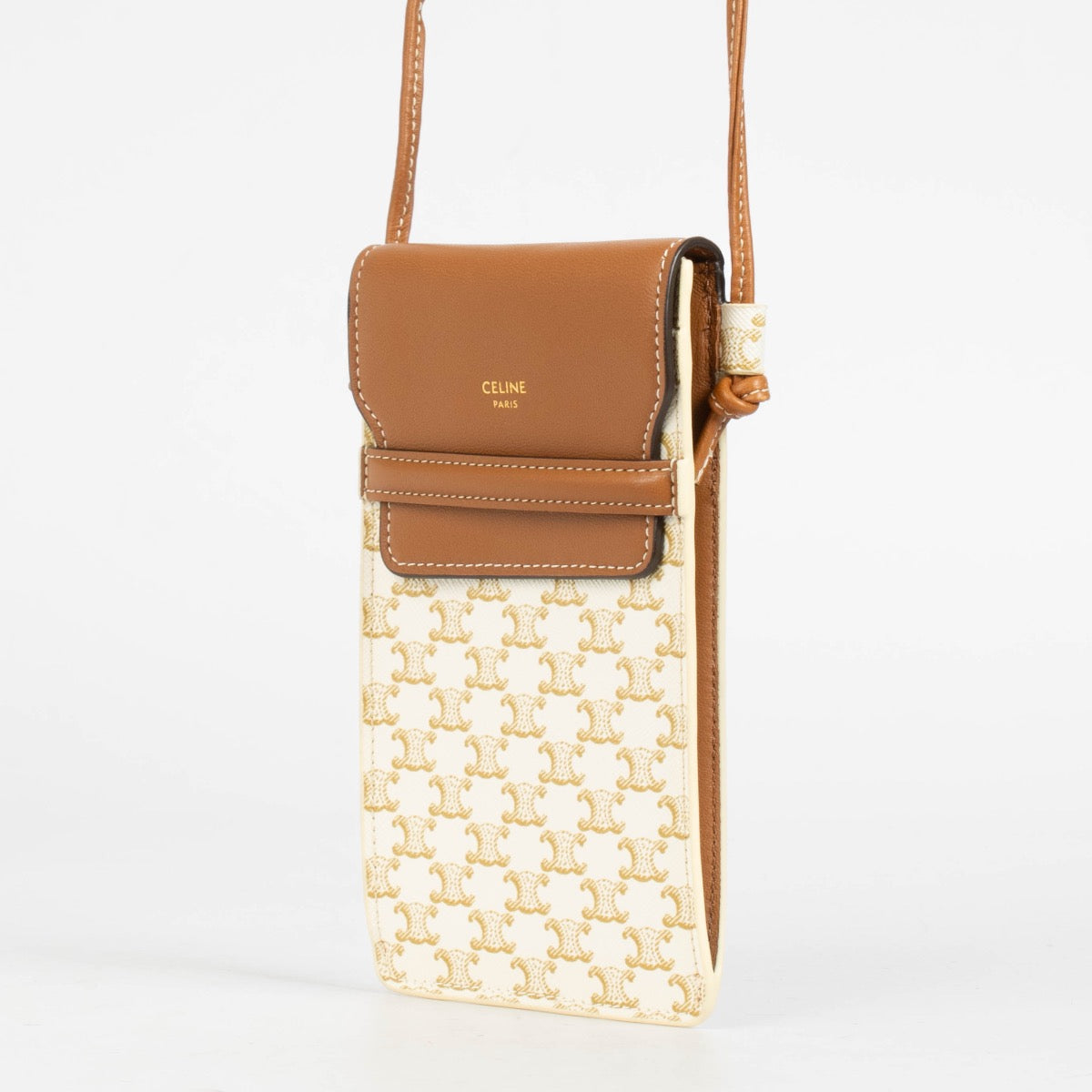 Authentic pre-loved Celine Brown/White Leather/Canvas Triomphe Phone holder on Labellov.com