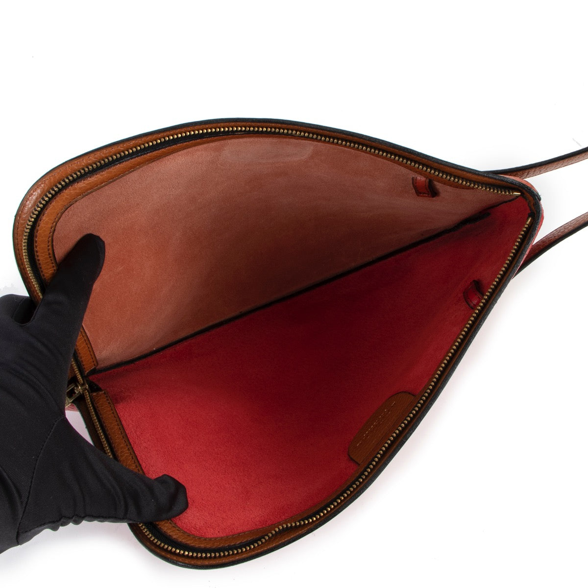 Buy online an authentic second hand Delvaux Red/Orange leather Clutch in very good condition at Labellov in Antwerp.