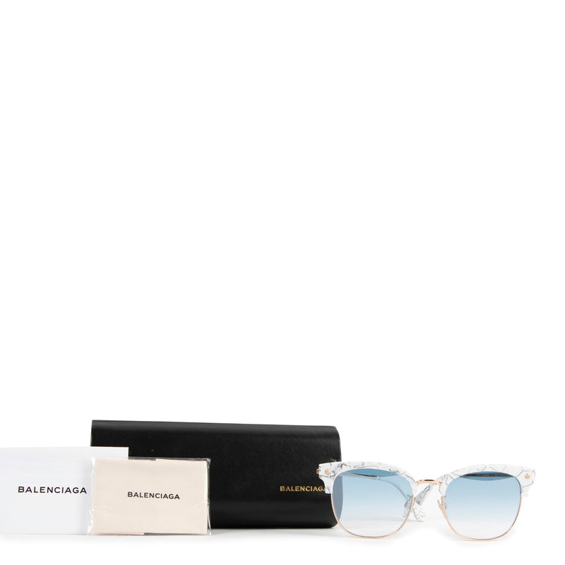 Buy online authentic second hand Balenciaga white marble frame glasses in very good condition at Labellov in Antwerp.