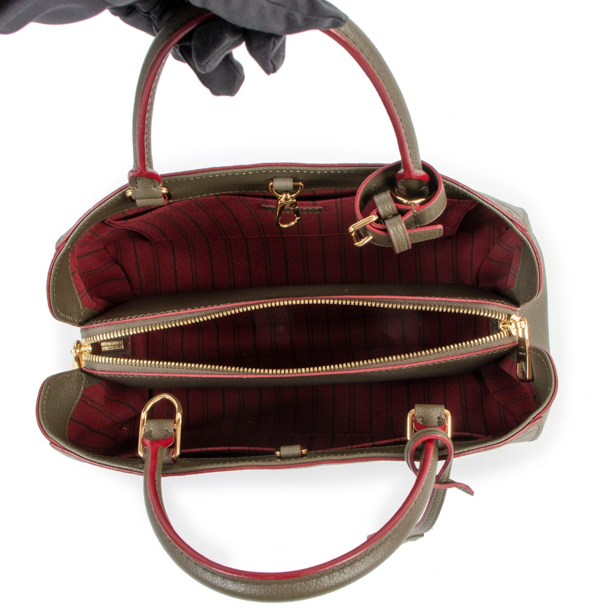 Buy online an authentic second hand Louis Vuitton Khaki Montaigne MM Monogram Empreinte in very good condition at Labellov in Antwerpen.