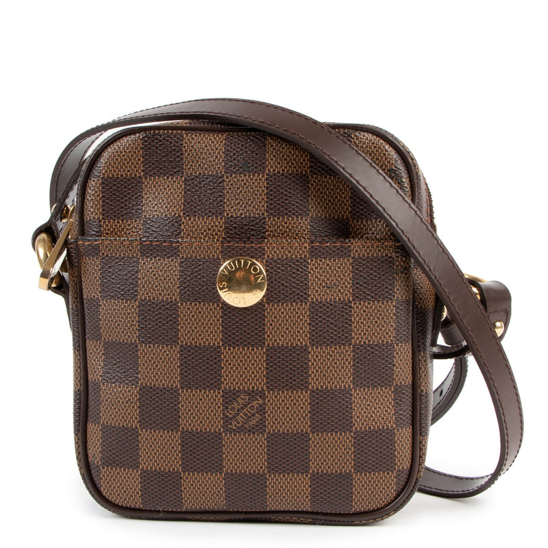 Buy online an authentic second hand Louis Vuitton Damier Ebene Rift Crossbody in very good condition at labellov in Antwerp.