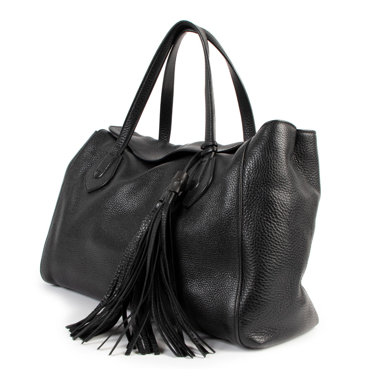 Buy online an authentic second hand Gucci Black Lady Tassel Pebbled Leather Top Handle in very good condition at Labellov in Antwerp.