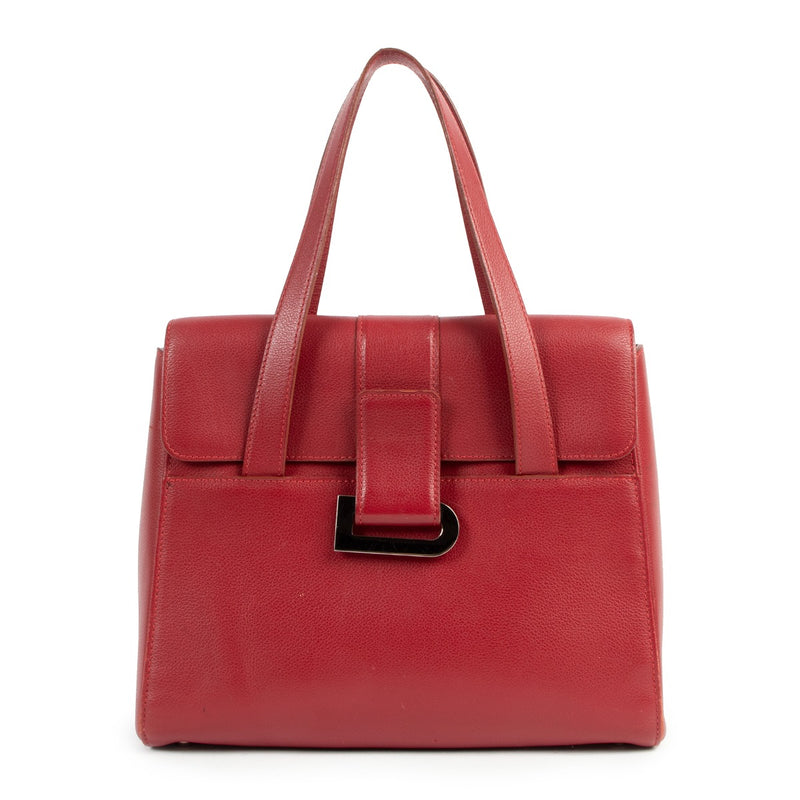 Buy online an authentic second hand Delvaux Red Reverie top handle bag in good condition at Labellov in Antwerp.