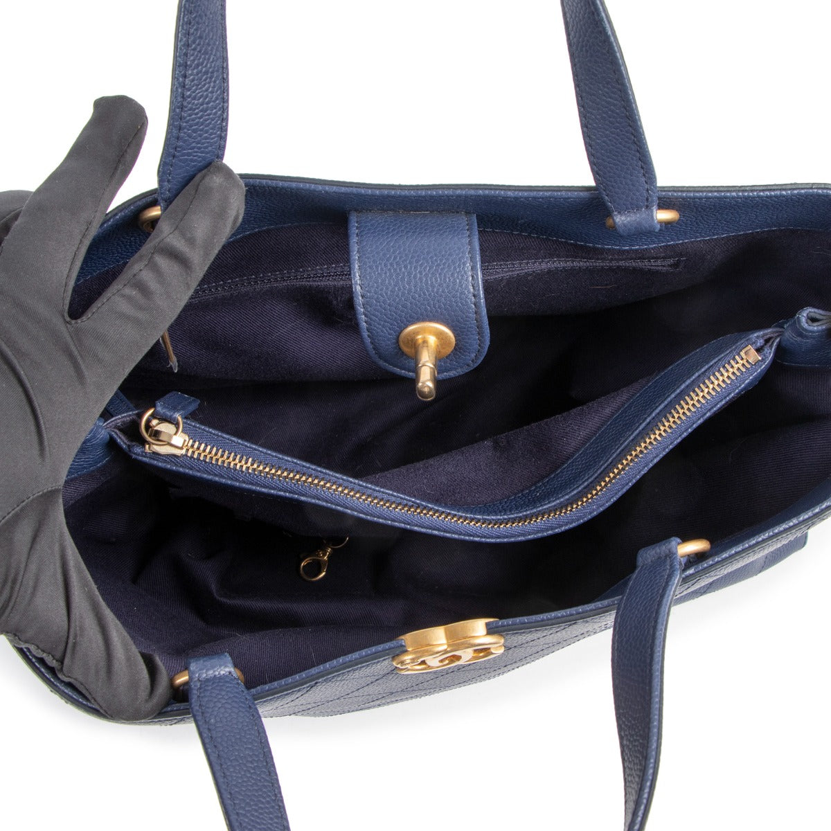 Buy online an authentic second hand Chanel Navy Blue Quilted Shopping Tote Bag in good condition at Labellov in Antwerp.