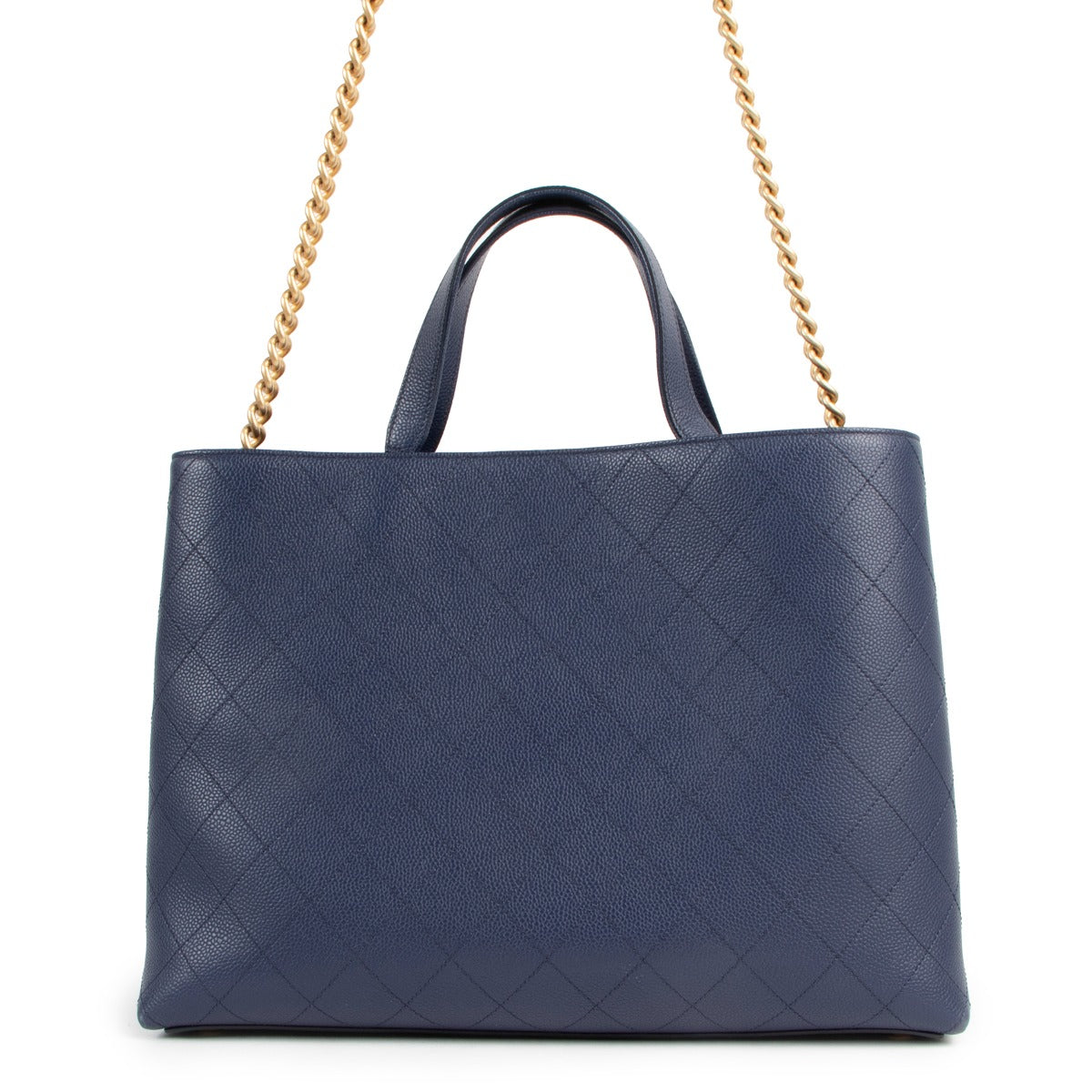 Buy online an authentic second hand Chanel Navy Blue Quilted Shopping Tote Bag in good condition at Labellov in Antwerp.