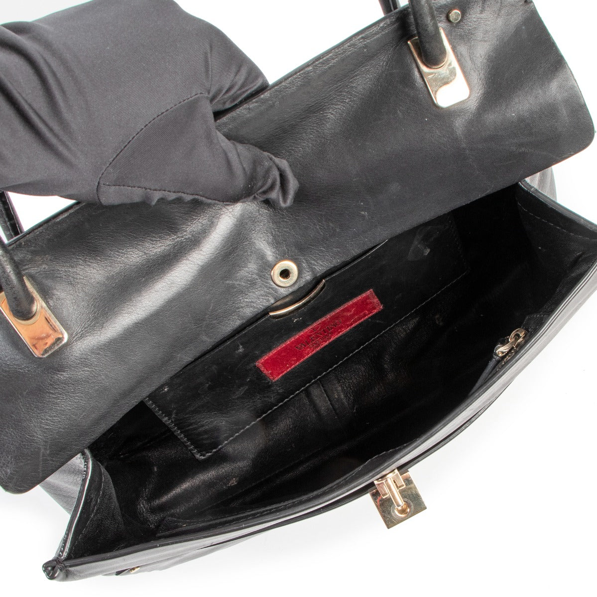 Shop safe online at Labellov in Antwerp this 100% authentic second hand Valentino Black Leather Top Handle