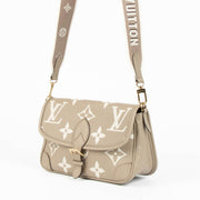 Shop the authentic Louis Vuitton Beige Empreinte Tourterelle Diane Crossbody Bag second hand on Labellov.com