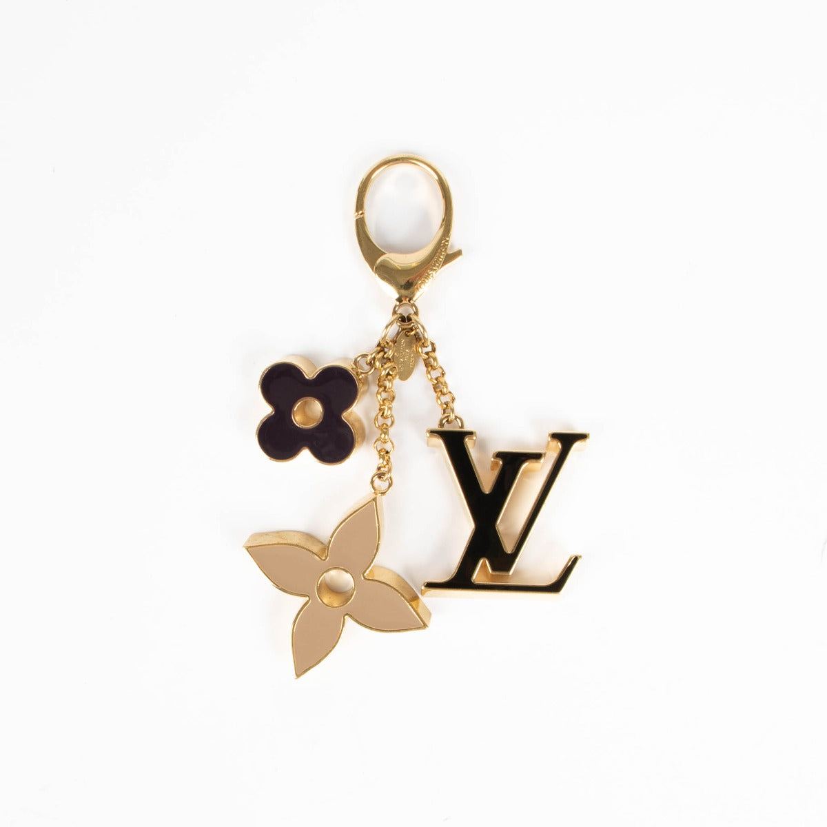Shop the authentic Louis Vuitton Gold Charm second hand on Labellov.com