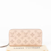 Shop the authentic Louis Vuitton Pink Mahina Zippy Wallet second hand on Labellov.com