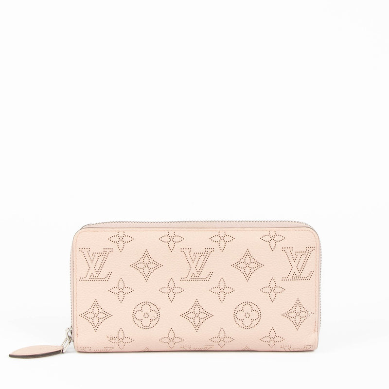 Shop the authentic Louis Vuitton Pink Mahina Zippy Wallet second hand on Labellov.com