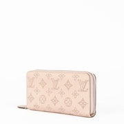Shop the authentic Louis Vuitton Pink Mahina Zippy Wallet second hand on Labellov.com