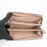 Shop the authentic Louis Vuitton Pink Mahina Zippy Wallet second hand on Labellov.com