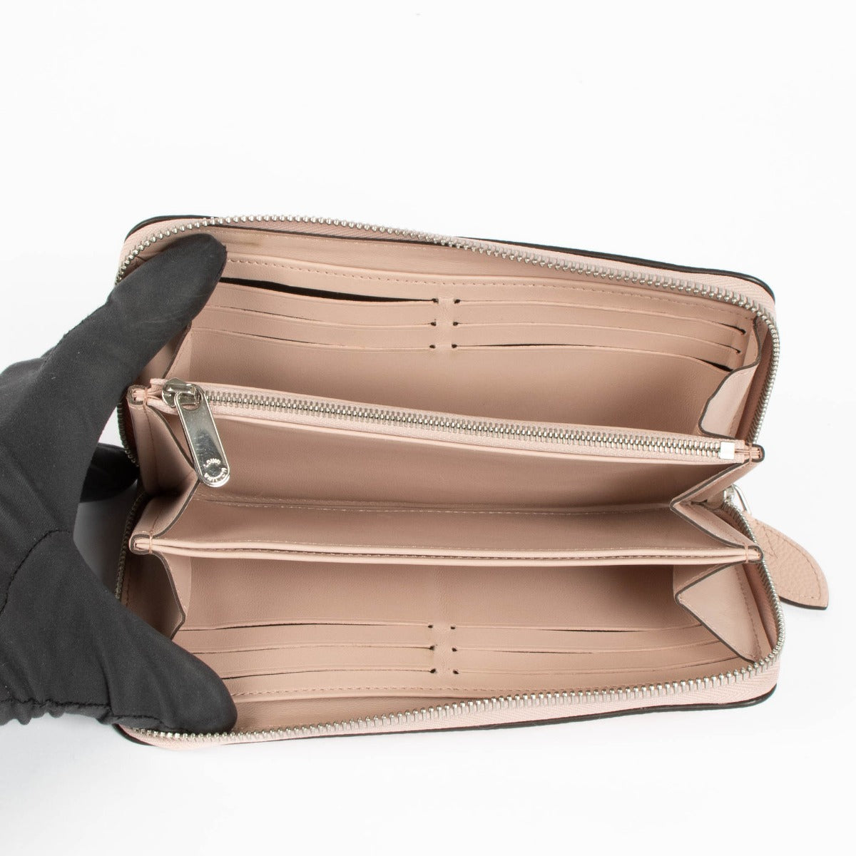Shop the authentic Louis Vuitton Pink Mahina Zippy Wallet second hand on Labellov.com