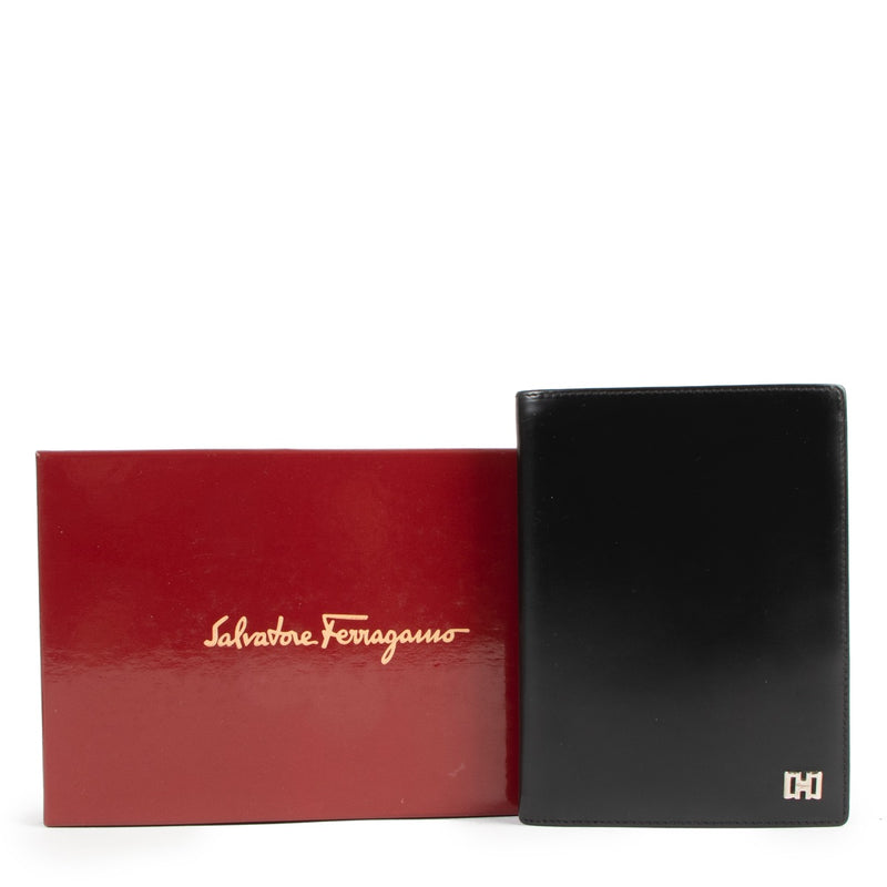 Buy an authentic second hand Salvatore Ferragamo Black Leather Wallet in very good condition at Labellov