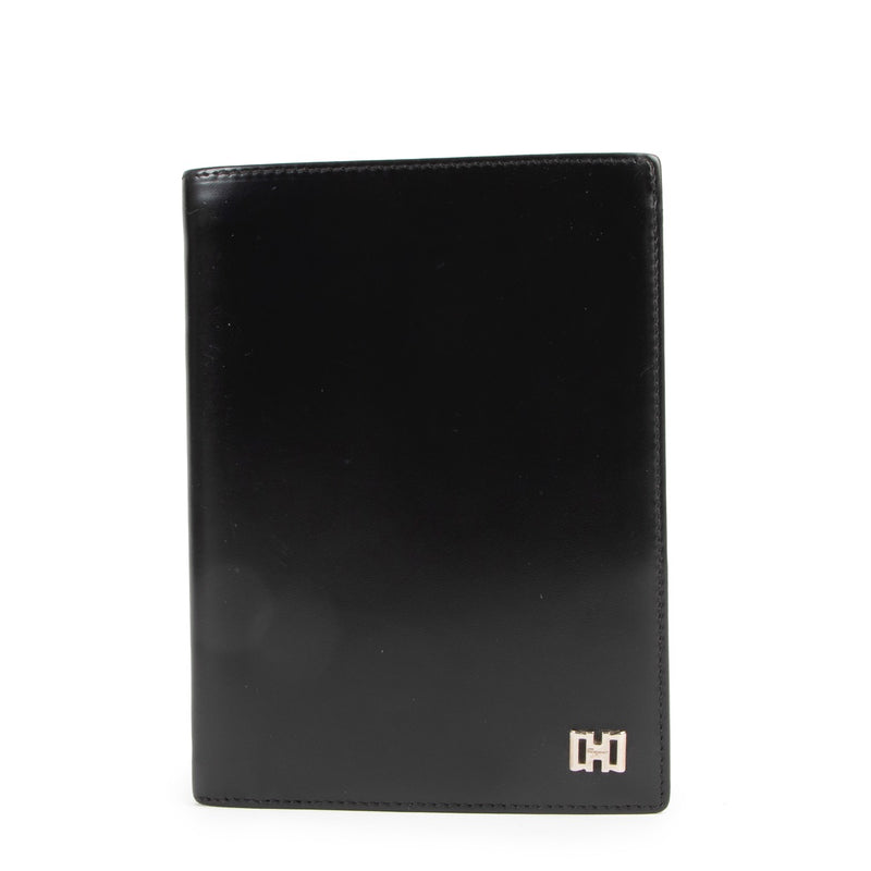 Buy an authentic second hand Salvatore Ferragamo Black Leather Wallet in very good condition at Labellov