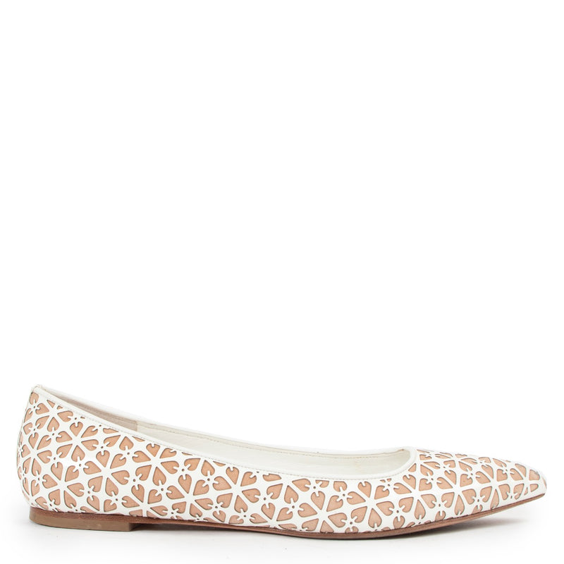 Shop now for your pre-loved, 100% authentic Alexander Mcqueen White Eggsiln Laser Cut Flats - Size 40 at Labellov in Antwerp