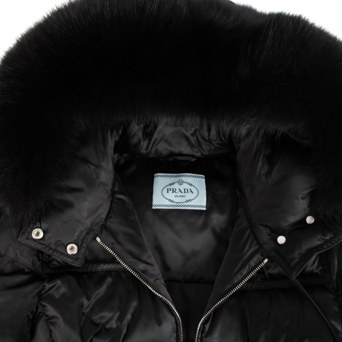 Shop safe online at Labellov in Antwerp, Brussels and Knokke this 100% authentic second hand Prada Black Fur Puffer Jacket - size IT44