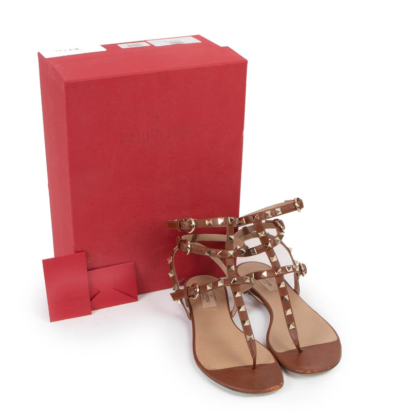 Shop now for your pre-loved, 100% authentic Red Valentino Brown Rockstud Caged Flat Sandals - Size 39 at Labellov in Antwerp