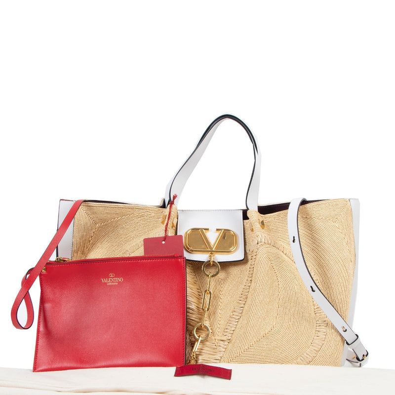 Shop now for your pre-loved, 100% authentic Valentino Garavani Beige Straw Woven Vlogo Tote Bag at Labellov in Antwerp