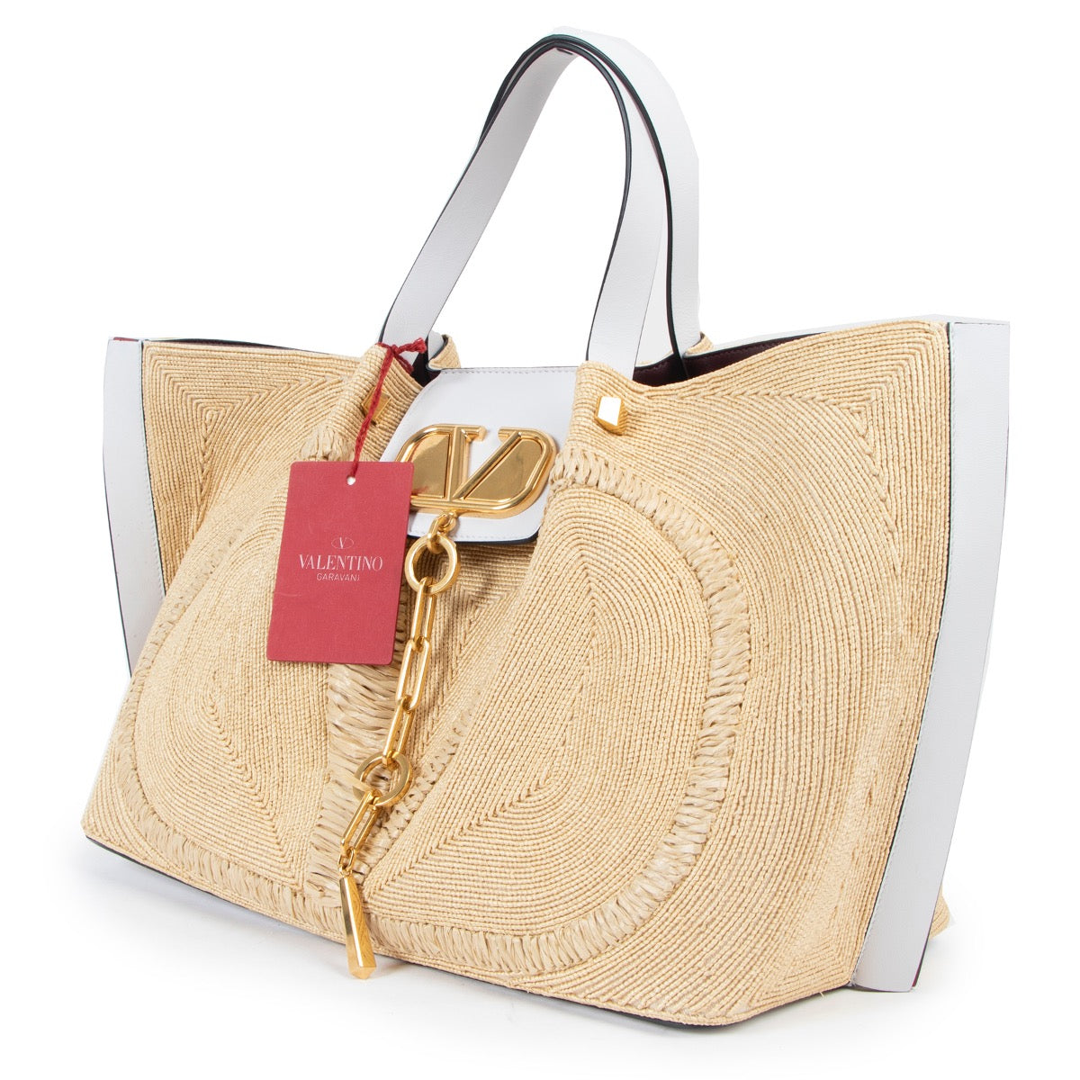 Shop now for your pre-loved, 100% authentic Valentino Garavani Beige Straw Woven Vlogo Tote Bag at Labellov in Antwerp