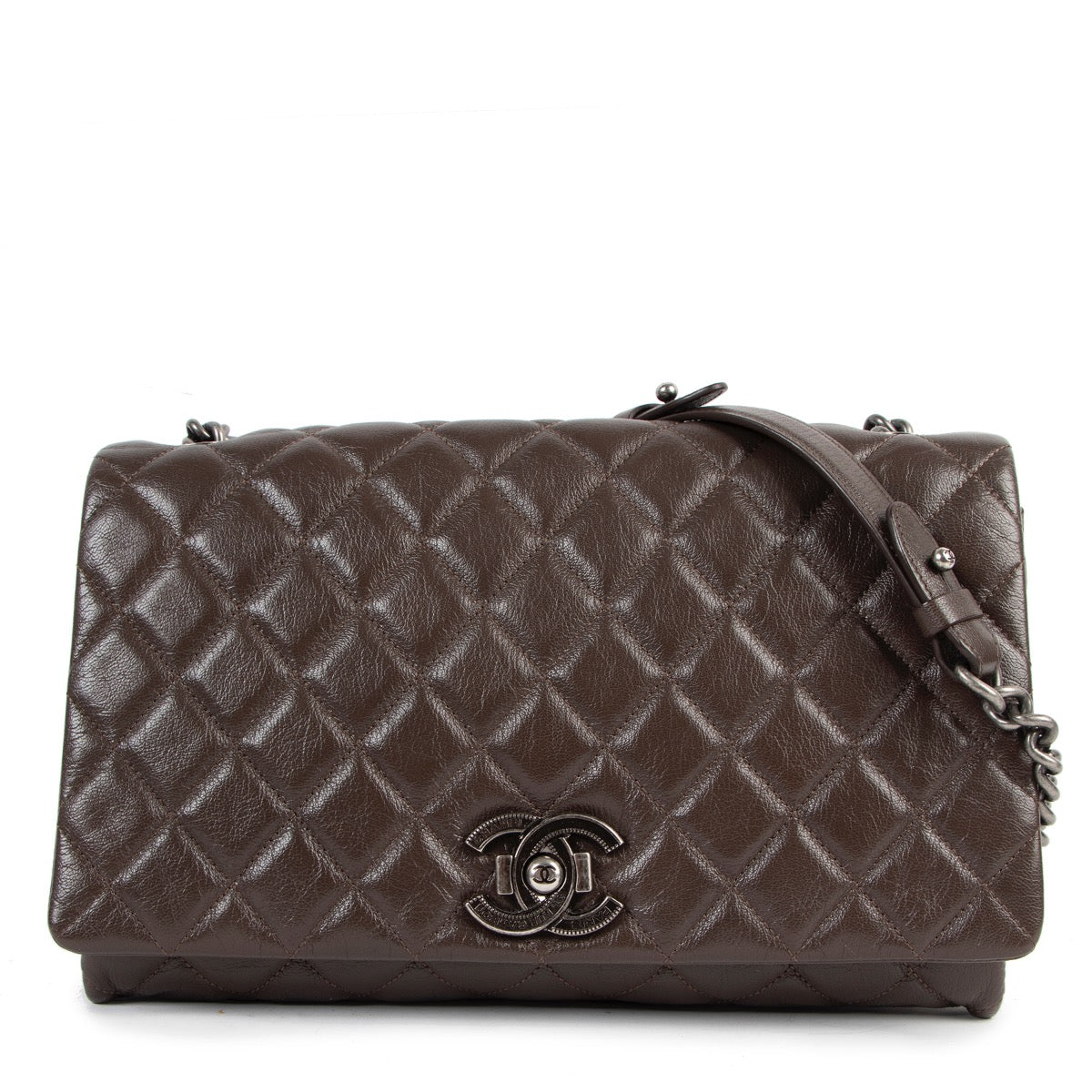 Shop safe online at Labellov in Antwerp this 100% authentic second hand Chanel Brown Metallic Quilted Goatskin City Rock Flap Shoulder Bag