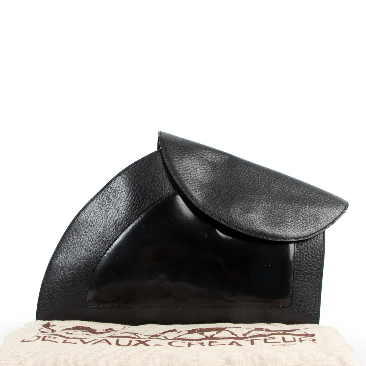 Buy authentic second hand Delvaux grained leather Black Clutch in good condition at Labellov in Antwerp.