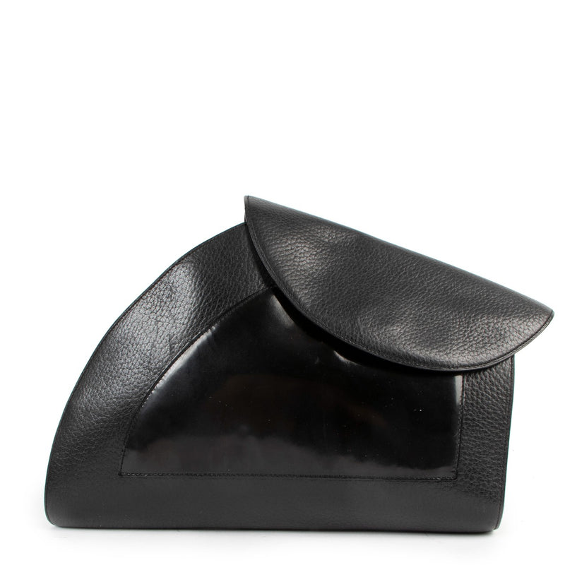 Buy authentic second hand Delvaux grained leather Black Clutch in good condition at Labellov in Antwerp.