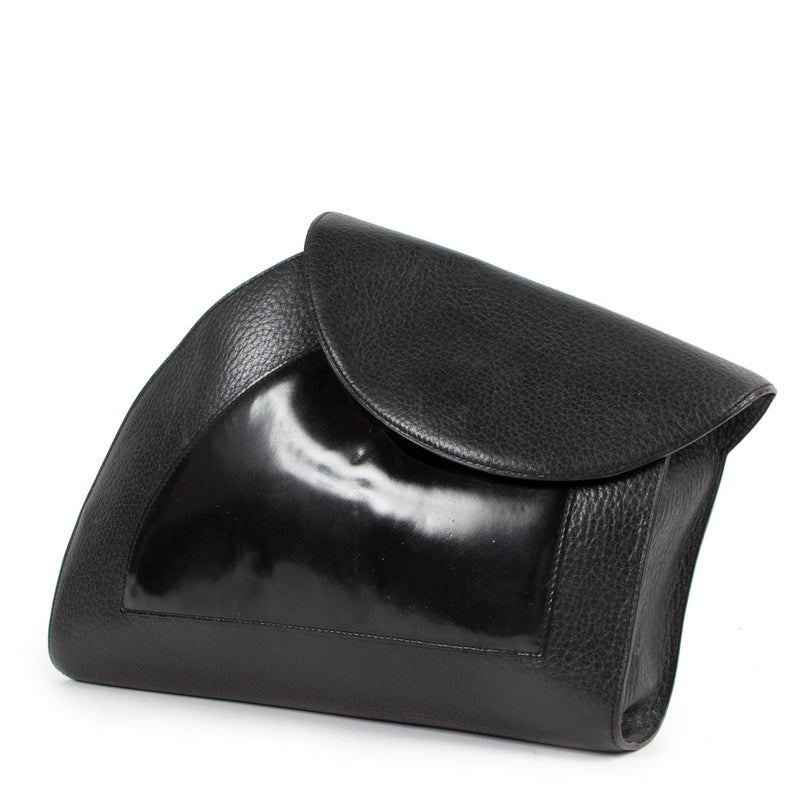 Buy authentic second hand Delvaux grained leather Black Clutch in good condition at Labellov in Antwerp.