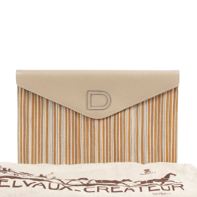 Shop safe online at Labellov in Antwerp this 100% authentic second hand Delvaux Multicolor Toile De Cuir Clutch