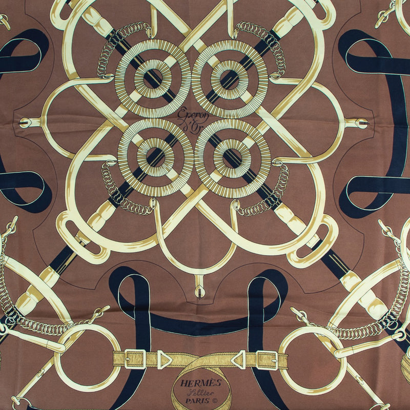 Buy authentic second hand Hermès Brown Silk Eperon D'Or Scarf in good condition at Labellov in Antwerp.