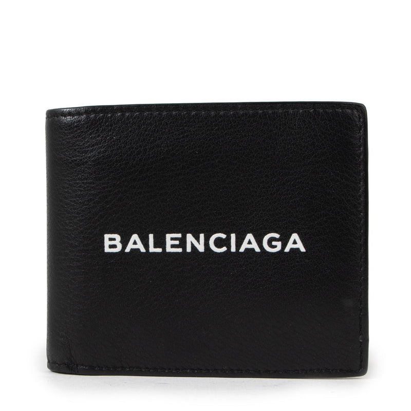 Buy an authentic second hand Balenciaga Black Leather Logo Print Square Folded Wallet in very good condition at Labellov